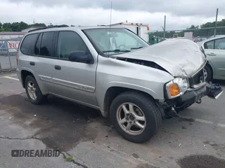 2004 GMC Envoy SLE z VIN 1GKDT13S242361580, wystawiony jako IAAI lot #42453931 z przebiegiem 174 776 mil mil oraz . Historia ofert i sprzedaży dostępna na DreamBid. Obrazek 1.