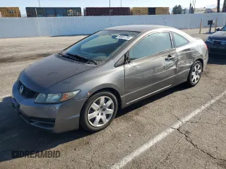 2010 Honda Civic Cpe LX with VIN 2HGFG1B61AH529839, listed as a Copart auction lot 69501724 with 218,443 mi miles and Salvage Title. Bid and sale history available at carsss.com. Image 1.