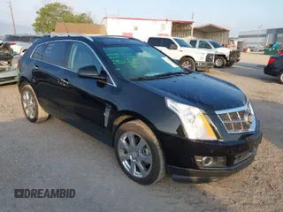 2012 Cadillac SRX Performance Collection with VIN 3GYFNBE35CS617766, listed as a IAAI auction lot 41864670 with 52,350 mi miles. Bid and sale history available at carsss.com. Image 1.