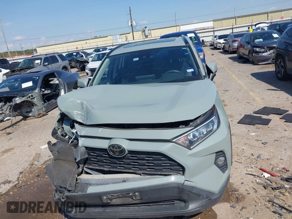 2019 Toyota RAV4 XLE with VIN JTMW1RFVXKD035994, listed as a IAAI auction lot 41868578 with 89,404 mi miles. Bid and sale history available at carsss.com. Image 12.