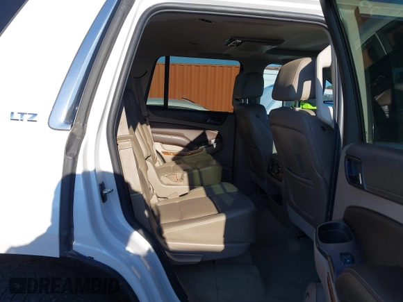 2016 Chevrolet Tahoe LTZ with VIN 1GNSKCKC0GR203348, listed as a IAAI auction lot 42220438 with 108,657 mi miles and . Bid and sale history available at DreamBid. Image 8.