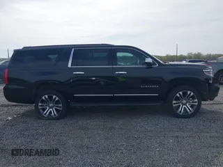 2019 Chevrolet Suburban LT with VIN 1GNSCHKC2KR408575, listed as a IAAI auction lot 42060103 with 144,838 mi miles and . Bid and sale history available at DreamBid. Image 13.
