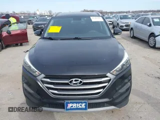 2018 Hyundai Tucson Sport with VIN KM8J33AL7JU772152, listed as a IAAI auction lot 41285203 with 87,188 mi miles. Bid and sale history available at carsss.com. Image 12.