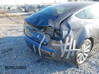2020 Tesla Model 3 Long Range with VIN 5YJ3E1EB9LF795408, listed as a IAAI auction lot 41735428 with 56,013 mi miles. Bid and sale history available at carsss.com. Image 6.