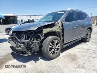 2017 Nissan Rogue S with VIN 5N1AT2MV0HC863660, listed as a Copart auction lot 61098185 with 100,561 mi miles and Salvage title. Bid and sale history available at DreamBid. Image 1.