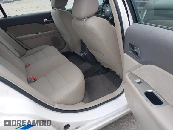 2011 Ford Fusion Hybrid z VIN 3FADP0L34BR202769, wystawiony jako IAAI lot #42504494 z przebiegiem 33 902 mil mil oraz . Historia ofert i sprzedaży dostępna na DreamBid. Obrazek 8.