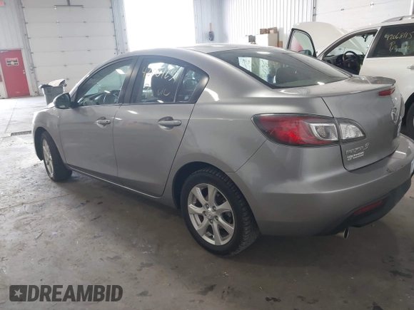 2011 Mazda Mazda3 i Touring with VIN JM1BL1VFXB1900999, listed as a IAAI auction lot 42067239 with 202,829 mi miles. Bid and sale history available at carsss.com. Image 3.
