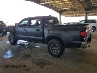 2018 Toyota Tacoma SR5 with VIN 3TMAZ5CN9JM075289, listed as a Copart auction lot 52409365 with 65,793 mi miles and Salvage Title. Bid and sale history available at DreamBid. Image 2.