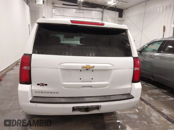 2020 Chevrolet Suburban LT with VIN 1GNSKHKC5LR108971, listed as a IAAI auction lot 41651417 with 90,674 mi miles. Bid and sale history available at carsss.com. Image 16.