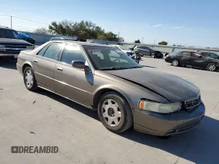 2003 Cadillac Seville Luxury SLS z VIN 1G6KS54Y93U279660, wystawiony jako Copart lot #75961404 z przebiegiem 107 591 mil mil oraz Szkoda całkowita • Salvage title. Historia ofert i sprzedaży dostępna na DreamBid. Obrazek 4.