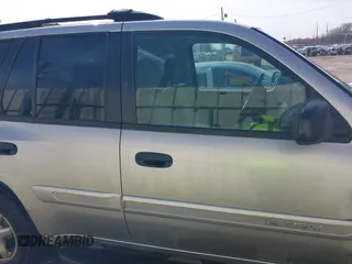 2005 GMC Envoy SLE with VIN 1GKDS13S252284455, listed as a IAAI auction lot 41455172 with 171,559 mi miles and . Bid and sale history available at DreamBid. Image 13.