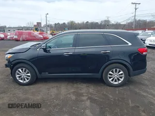 2017 Kia Sorento LX with VIN 5XYPGDA56HG209874, listed as a IAAI auction lot 42041004 with 151,205 mi miles and . Bid and sale history available at carsss.com. Image 14.
