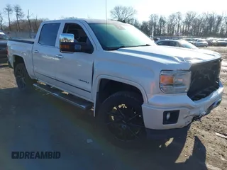 2014 GMC Sierra 1500 Denali z VIN 3GTU2WEC7EG532544, wystawiony jako IAAI lot #41535120 z przebiegiem 125 805 mil mil oraz . Historia ofert i sprzedaży dostępna na DreamBid. Obrazek 1.