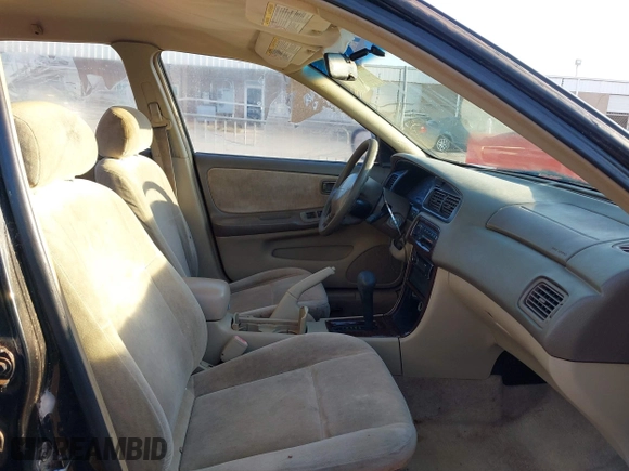 1999 Nissan Altima XE with VIN 1N4DL01D2XC156582, listed as a IAAI auction lot 41783168 with 292,251 mi miles. Bid and sale history available at carsss.com. Image 5.