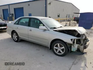 2002 Toyota Avalon XL z VIN 4T1BF28B22U200555, wystawiony jako Copart lot #54544265 z przebiegiem 146 031 mil mil oraz Tytuł czysty. Historia ofert i sprzedaży dostępna na DreamBid. Obrazek 4.