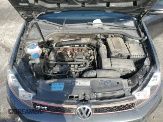 2010 Volkswagen GTI z VIN WVWGV7AJ6AW418495, wystawiony jako Copart lot #84345214 z przebiegiem 120 471 mil mil oraz Czysty tytuł • Clean title. Historia ofert i sprzedaży dostępna na DreamBid. Obrazek 11.
