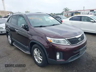 2015 Kia Sorento LX with VIN 5XYKTDA7XFG574840, listed as a IAAI auction lot 42655124 with 128,183 mi miles and . Bid and sale history available at DreamBid. Image 1.