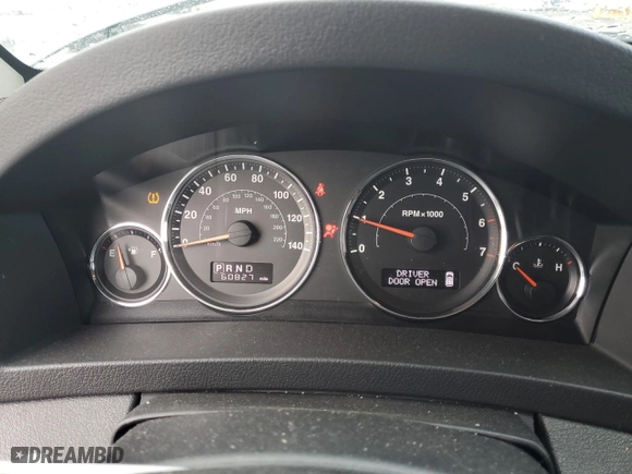 2010 Jeep Grand Cherokee Laredo with VIN 1J4RR4GT7AC120604, listed as a Copart auction lot 84257724 with 60,827 mi miles and Salvage Title. Bid and sale history available at carsss.com. Image 9.