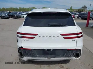 2022 Genesis GV70 2.5T with VIN KMUMADTB0NU043317, listed as a IAAI auction lot 42222034 with 30,566 mi miles and . Bid and sale history available at DreamBid. Image 17.