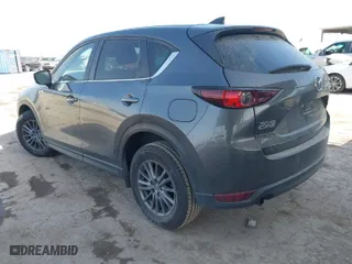 2019 Mazda CX-5 Touring with VIN JM3KFACMXK0686957, listed as a IAAI auction lot 41720338 with 95,421 mi miles. Bid and sale history available at carsss.com. Image 3.