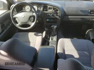 2002 Nissan Pathfinder SE z VIN JN8DR09Y02W719639, wystawiony jako Copart lot #53619955 z przebiegiem 117 174 mil mil oraz Szkoda całkowita • Salvage title. Historia ofert i sprzedaży dostępna na DreamBid. Obrazek 8.