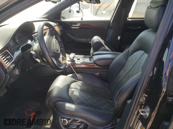 2013 Audi A8 3.0L with VIN WAURGAFD9DN004556, listed as a Copart auction lot 65018975 with 138,090 mi miles and Salvage title. Bid and sale history available at DreamBid. Image 7.