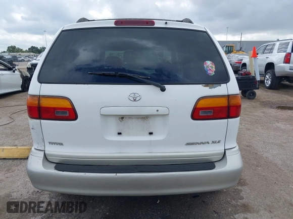 1999 Toyota Sienna LE with VIN 4T3ZF13C1XU152733, listed as a IAAI auction lot 40819395 with 184,540 mi miles. Bid and sale history available at carsss.com. Image 16.