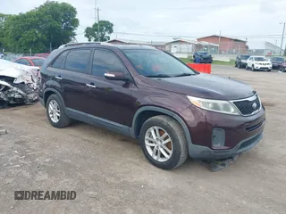 2014 Kia Sorento LX with VIN 5XYKT4A71EG492509, listed as a IAAI auction lot 42702989 with 153,910 mi miles and . Bid and sale history available at DreamBid. Image 1.