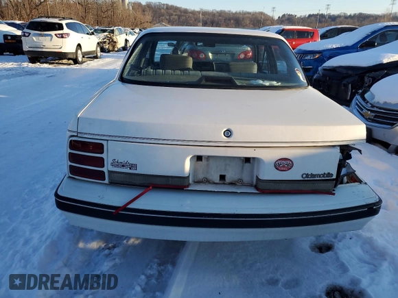 1991 Oldsmobile Cutlass z VIN 1G3AJ54N9M6353764, wystawiony jako Copart lot #87502015 z przebiegiem 170 646 mil mil oraz Szkody całkowita. Historia ofert i sprzedaży dostępna na DreamBid. Obrazek 6.