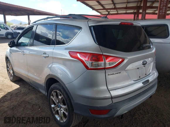 2013 Ford Escape SE with VIN 1FMCU0GX9DUB83512, listed as a IAAI auction lot 41970256 with 69,897 mi miles and . Bid and sale history available at DreamBid. Image 3.