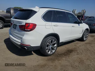 2014 BMW X5 xDrive50i z VIN 5UXKR6C55E0C03032, wystawiony jako Copart lot #57274505 z przebiegiem 107 963 mil mil oraz Czysty tytuł • Clean title. Historia ofert i sprzedaży dostępna na DreamBid. Obrazek 3.