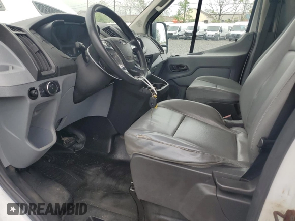 2015 Ford Transit Cargo z VIN 1FTNR3XM8FKB23144, wystawiony jako Copart lot #56115225 z przebiegiem 72 078 mil mil oraz Czysty tytuł • Clean title. Historia ofert i sprzedaży dostępna na DreamBid. Obrazek 7.