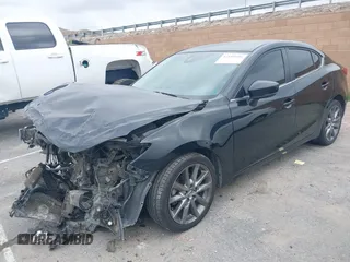 2018 Mazda 3 Touring with VIN 3MZBN1V30JM201671, listed as a IAAI auction lot 42189105 with 174,284 mi miles and . Bid and sale history available at carsss.com. Image 17.