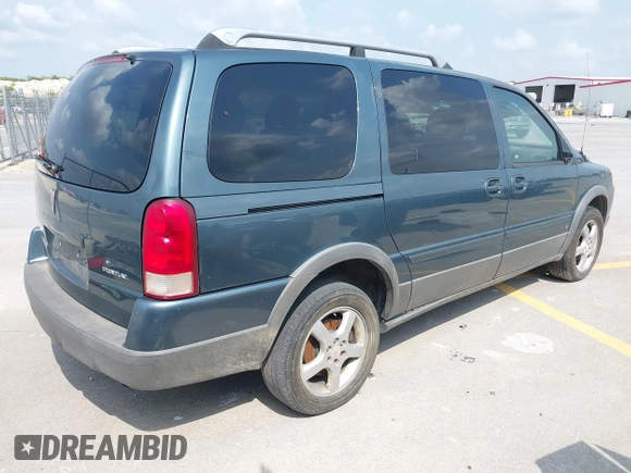 2006 Pontiac Montana SV6 with VIN 1GMDV33L66D211615, listed as a IAAI auction lot 42004609 with 264,541 mi miles. Bid and sale history available at carsss.com. Image 4.