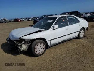 1996 Honda Accord LX with VIN 1HGCD5630TA189393, listed as a Copart auction lot 56877645 with 263,856 mi miles and Salvage title. Bid and sale history available at DreamBid. Image 1.