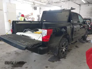 2021 Nissan Titan Pro-4X with VIN 1N6AA1ED6MN517649, listed as a IAAI auction lot 41731345 with 71,855 mi miles and . Bid and sale history available at DreamBid. Image 4.