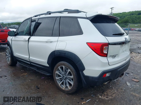 2019 Honda Passport Elite with VIN 5FNYF8H0XKB005151, listed as a IAAI auction lot 42322644 with 124,274 mi miles and . Bid and sale history available at DreamBid. Image 3.