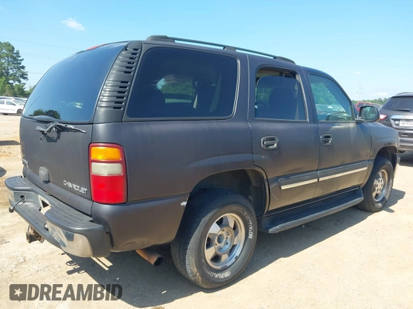 2004 Chevrolet Tahoe LS z VIN 1GNEC13V74R295259, wystawiony jako IAAI lot #42339839 z przebiegiem 264 778 mil mil oraz . Historia ofert i sprzedaży dostępna na DreamBid. Obrazek 4.