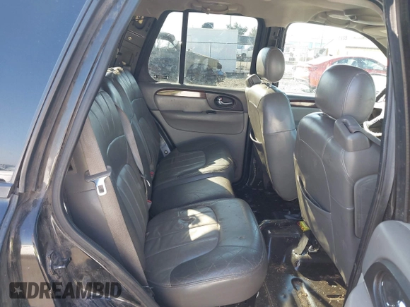 2002 GMC Envoy SLT z VIN 1GKDT13S522146661, wystawiony jako IAAI lot #40502587 z przebiegiem 274 877 mil mil oraz . Historia ofert i sprzedaży dostępna na DreamBid. Obrazek 8.