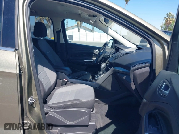 2013 Ford Escape SE with VIN 1FMCU0G99DUC05901, listed as a IAAI auction lot 42194672 with 121,435 mi miles and . Bid and sale history available at DreamBid. Image 5.