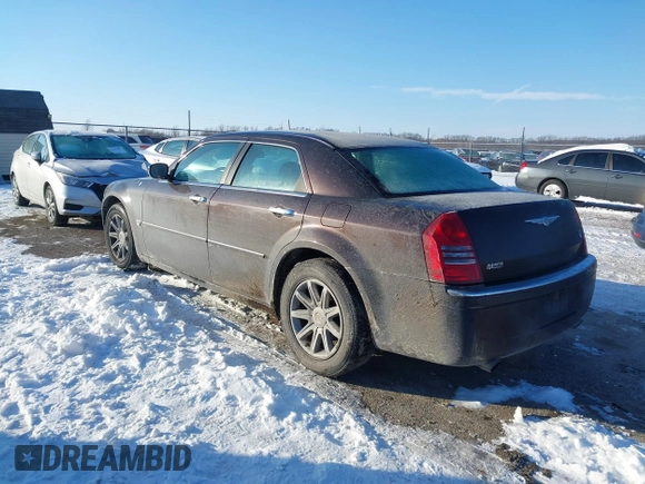2005 Chrysler 300 with VIN 2C3AA63H65H526016, listed as a IAAI auction lot 41296420 with 136,794 mi miles. Bid and sale history available at carsss.com. Image 3.