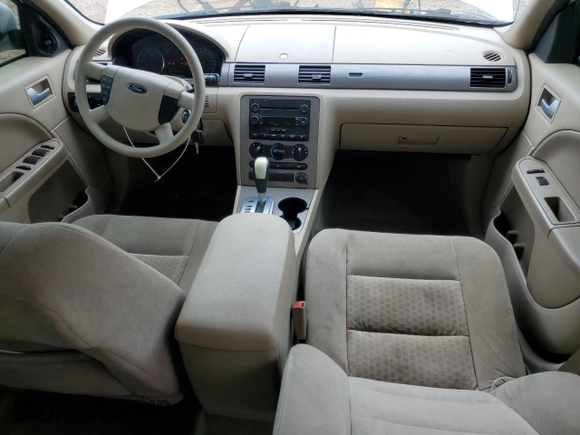 2005 Ford Five Hundred SE z VIN 1FAFP23155G171840, wystawiony jako Copart lot #54190685 z przebiegiem 147 383 mil mil oraz Szkoda całkowita • Salvage title. Historia ofert i sprzedaży dostępna na DreamBid. Obrazek 8.