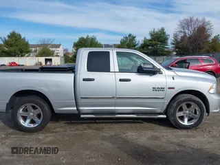 2014 Ram 1500 Express z VIN 1C6RR7FTXES136971, wystawiony jako IAAI lot #41845334 z przebiegiem 94 893 mil mil oraz . Historia ofert i sprzedaży dostępna na DreamBid. Obrazek 13.