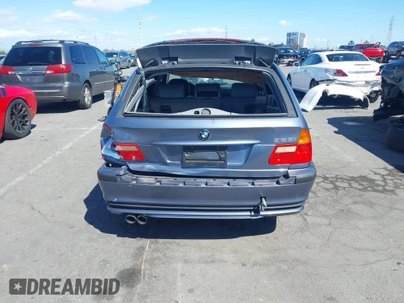 2003 BMW 3 Series 325i with VIN WBAEN33443PC11690, listed as a IAAI auction lot 41939082 with 159,123 mi miles. Bid and sale history available at carsss.com. Image 16.