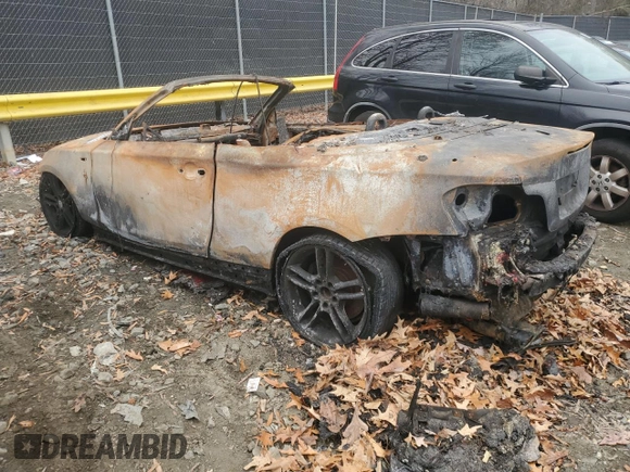 2011 BMW 1 Series 135i with VIN WBAUN7C52BVM23944, listed as a Copart auction lot 84061924 with Not provided miles and Salvage title. Bid and sale history available at DreamBid. Image 2.