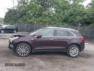 2017 Cadillac XT5 Platinum AWD z VIN 1GYKNFRS2HZ224860, wystawiony jako IAAI lot #42272142 z przebiegiem 95 697 mil mil oraz . Historia ofert i sprzedaży dostępna na DreamBid. Obrazek 14.