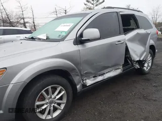 2016 Dodge Journey SXT with VIN 3C4PDDBG2GT242127, listed as a IAAI auction lot 41485555 with 119,728 mi miles. Bid and sale history available at carsss.com. Image 6.
