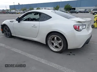2013 Subaru BRZ Limited with VIN JF1ZCAC18D1603809, listed as a IAAI auction lot 41708091 with 112,084 mi miles and . Bid and sale history available at DreamBid. Image 3.