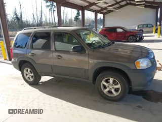 2006 Mazda Tribute i with VIN 4F2YZ02Z26KM12180, listed as a IAAI auction lot 41959606 with 228,217 mi miles and . Bid and sale history available at DreamBid. Image 13.