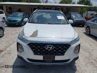 2019 Hyundai Santa Fe Limited z VIN 5NMS5CAA1KH136238, wystawiony jako IAAI lot #42314285 z przebiegiem 74 606 mil mil oraz . Historia ofert i sprzedaży dostępna na DreamBid. Obrazek 6.